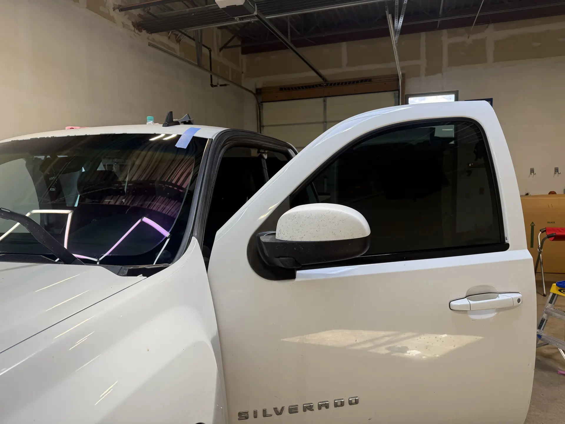 Chip repair curing under UV light in Glenwood Springs, CO